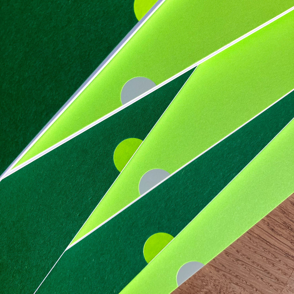 Mark + Fold exercise books in shades of green