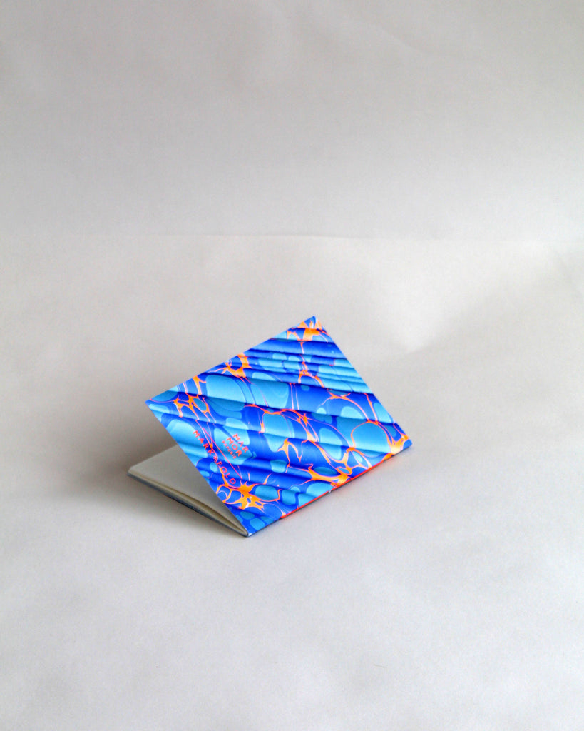 A6 notebook, featuring hand-marbled Rockpool design by Marmor Paperie for Mark+Fold, using the Spanish Wave technique of traditional paper marbling. 48 pages 120gsm fountain pen friendly paper.