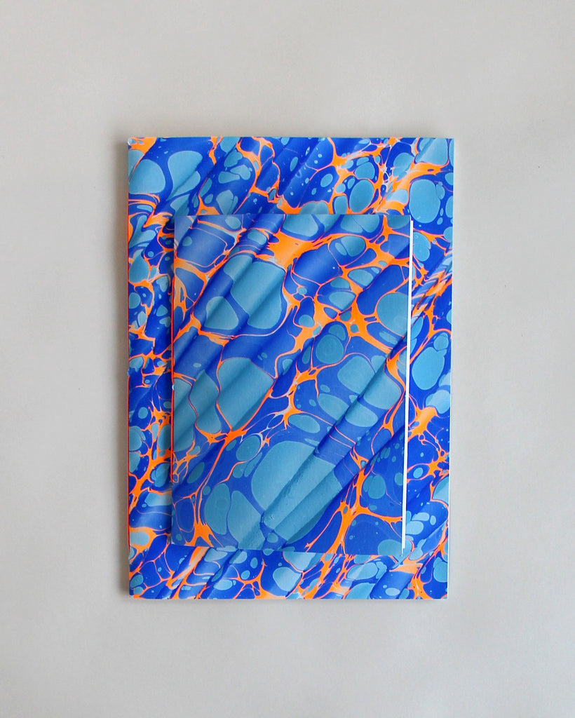 Pair of notebooks in A5 and A6, featuring hand-marbled Rockpool design by Marmor Paperie for Mark+Fold, using the Spanish Wave technique of traditional paper marbling. 48 pages 120gsm fountain pen friendly paper.