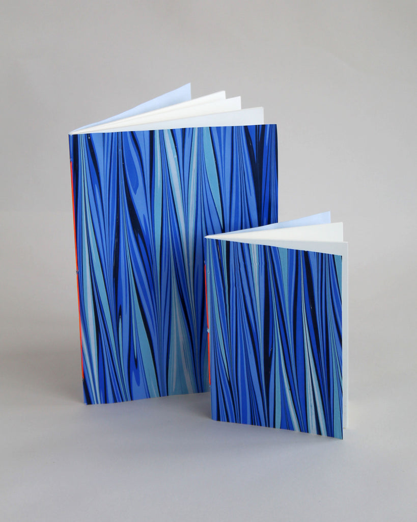 Pair of notebooks in A5 and A6, featuring hand-marbled tide design by Marmor Paperie for Mark+Fold, using ebru turkish marbling technique. Covers made in Deptford London.