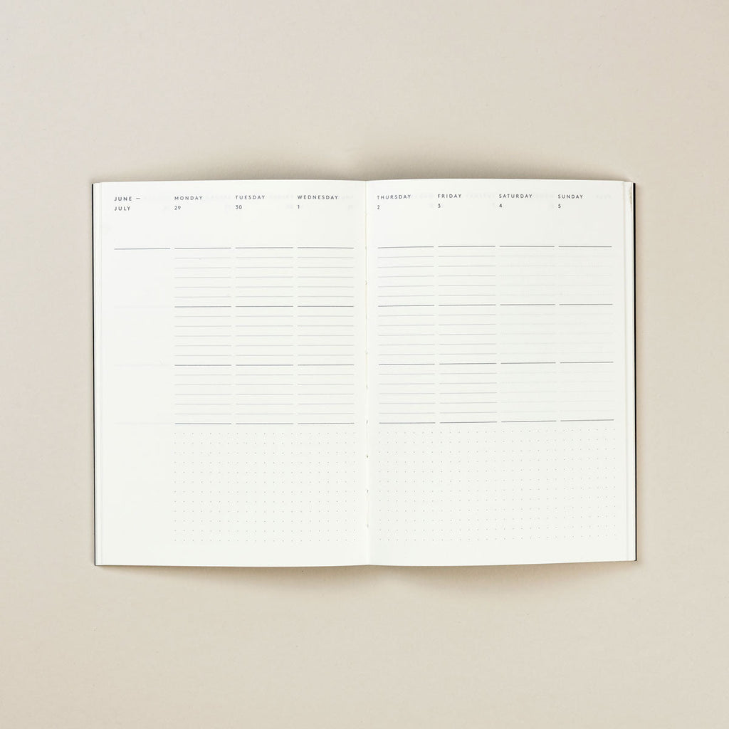 Mark+Fold's award-winning minimal diary layout, week-to-view pages with maximum writing space and no 'page clutter.' The page is divided into neat zones, but without prescriptive pointers telling you what to write where.