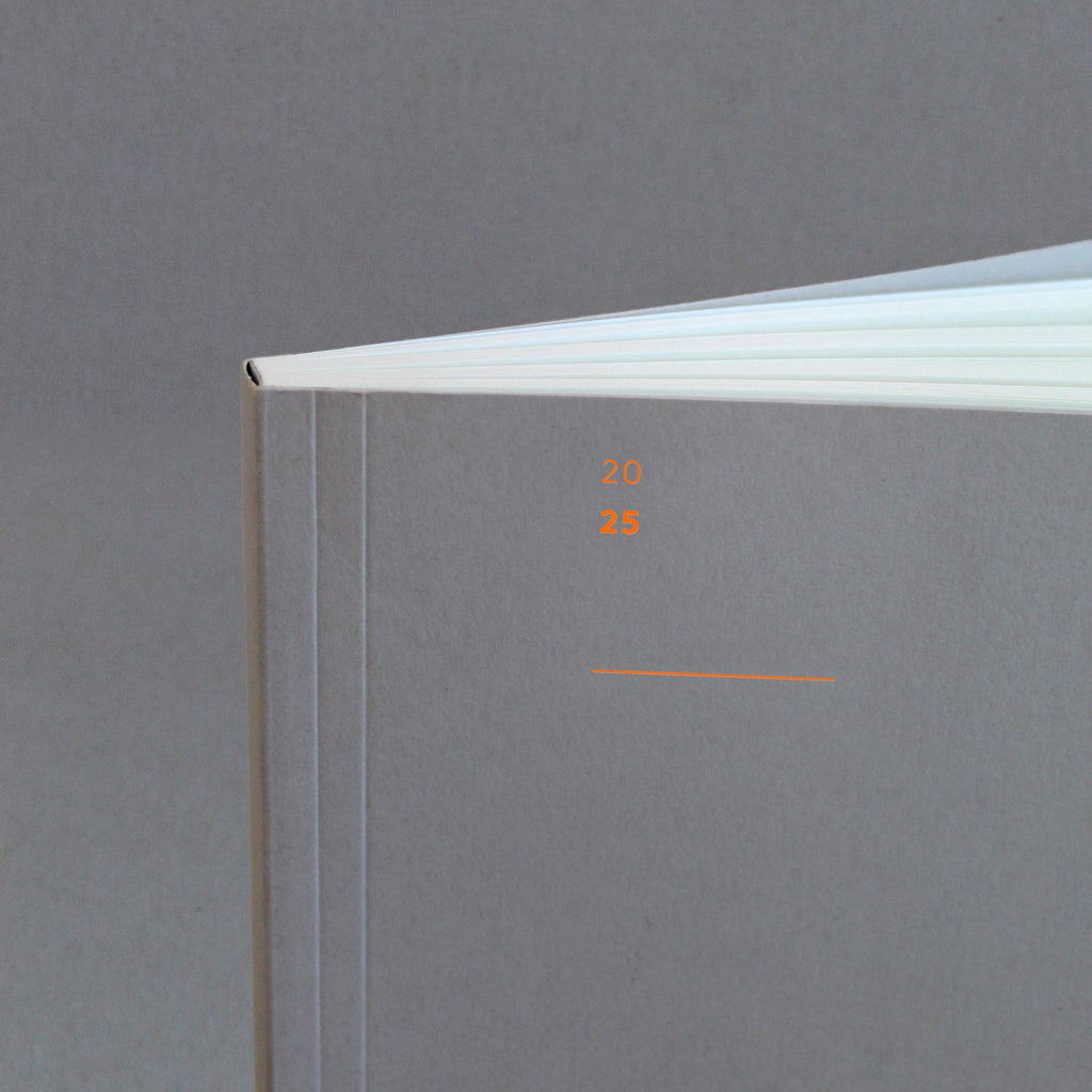 Mark+Fold 2025 Diary in Cloud with neon orange foil