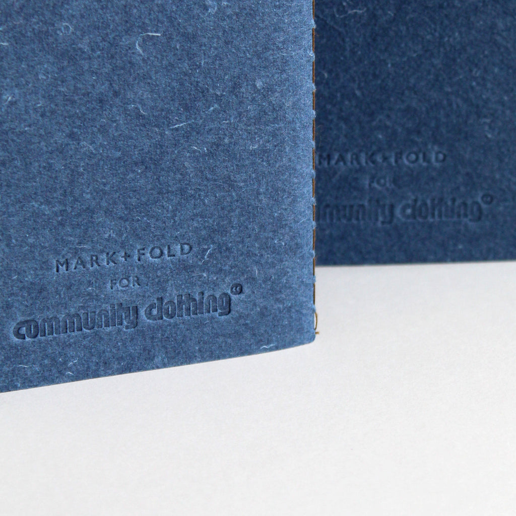 Indigo notebook with Mark+Fold for Community Clothing logo