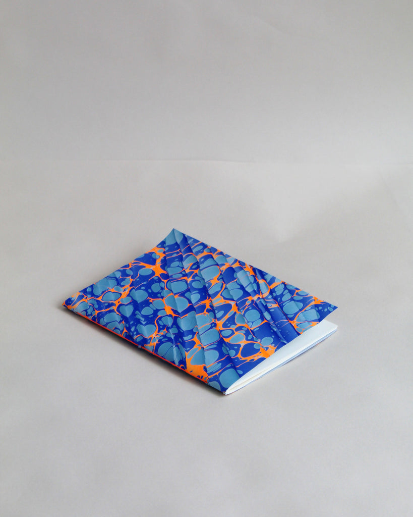 A5 notebook, featuring hand-marbled Rockpool design by Marmor Paperie for Mark+Fold, using the Spanish Wave technique of traditional paper marbling. 48 pages 120gsm fountain pen friendly paper.