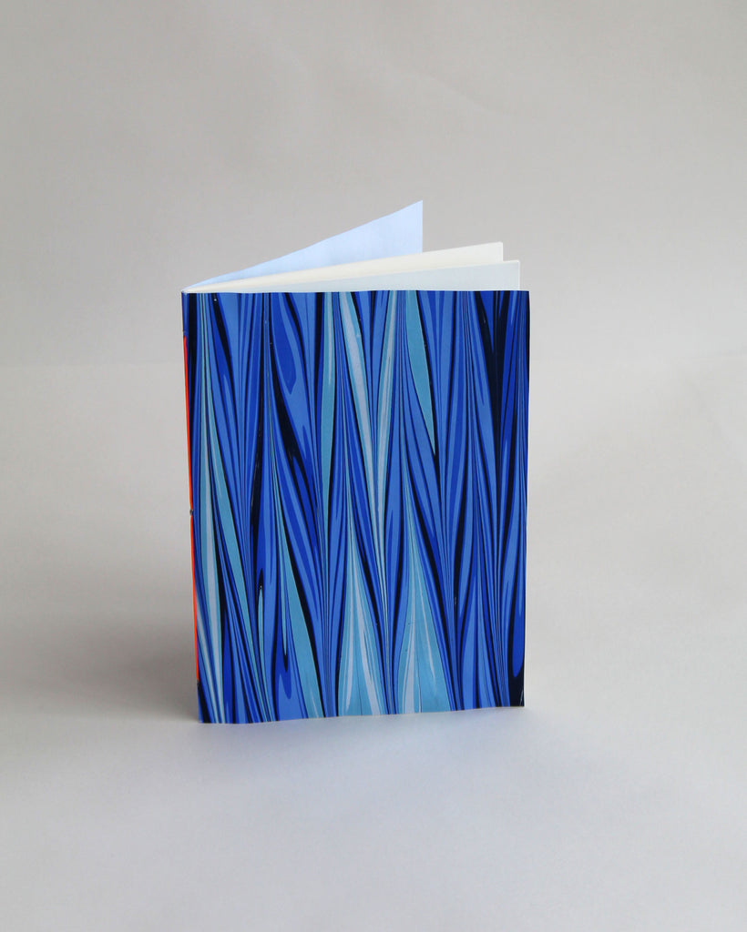 A5 notebook, featuring hand-marbled tide design by Marmor Paperie for Mark+Fold, and 120gsm fountain pen friendly pages, sewn in Suffolk UK.