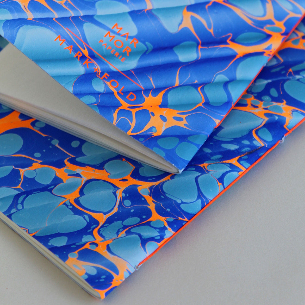 Pair of notebooks in A5 and A6, featuring hand-marbled Rockpool design by Marmor Paperie for Mark+Fold, using the Spanish Wave technique of traditional paper marbling. 48 pages 120gsm fountain pen friendly paper.