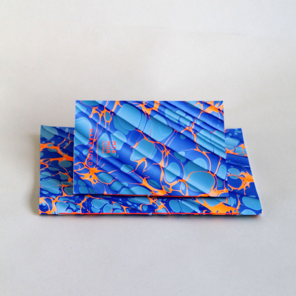 Pair of notebooks in A5 and A6, featuring hand-marbled Rockpool design by Marmor Paperie for Mark+Fold, using the Spanish Wave technique of traditional paper marbling. 48 pages 120gsm fountain pen friendly paper.