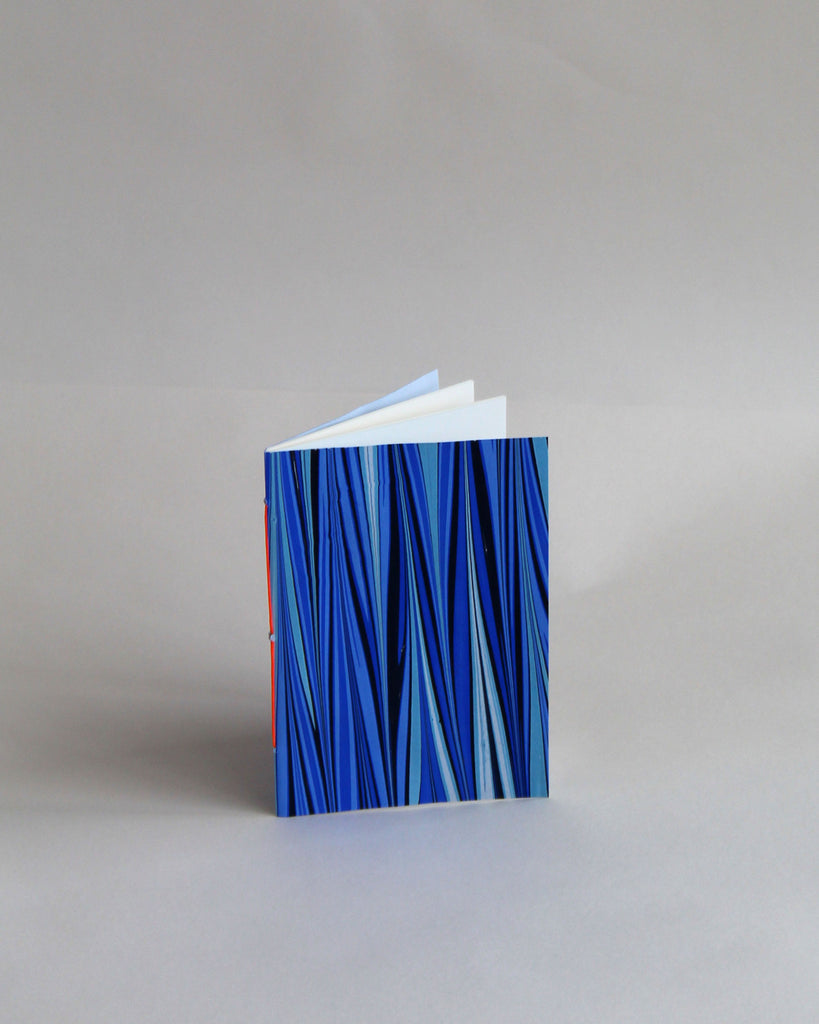 A6 notebook, featuring hand-marbled tide design by Marmor Paperie for Mark+Fold, and 120gsm fountain pen friendly pages, sewn in Suffolk UK.