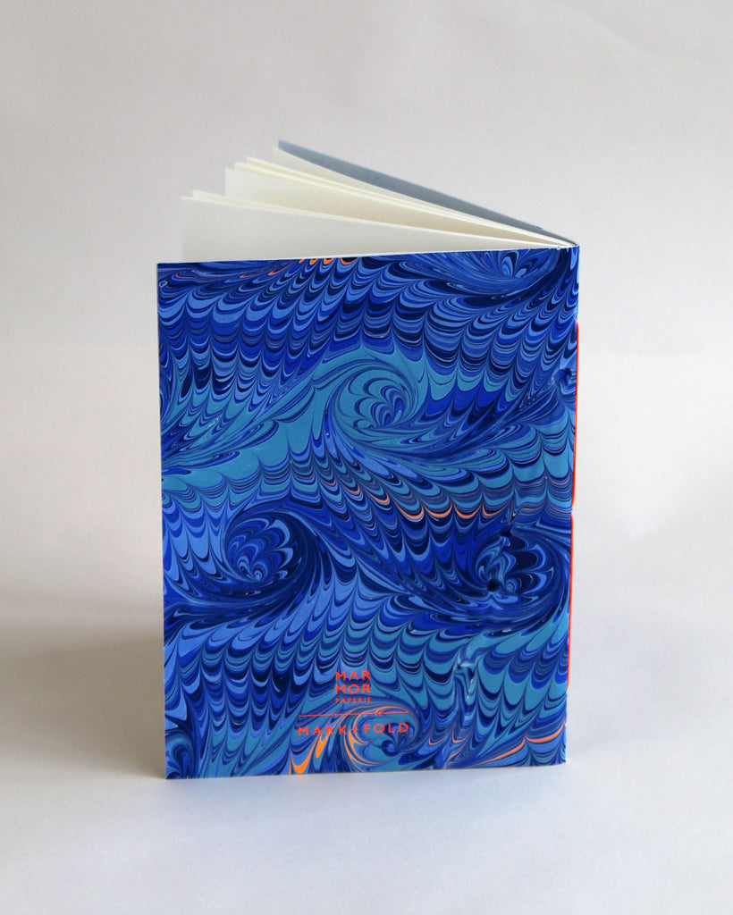 A5 notebook, featuring hand-marbled wave design by Marmor Paperie for Mark+Fold, using the french curl ebru turkish marbling technique