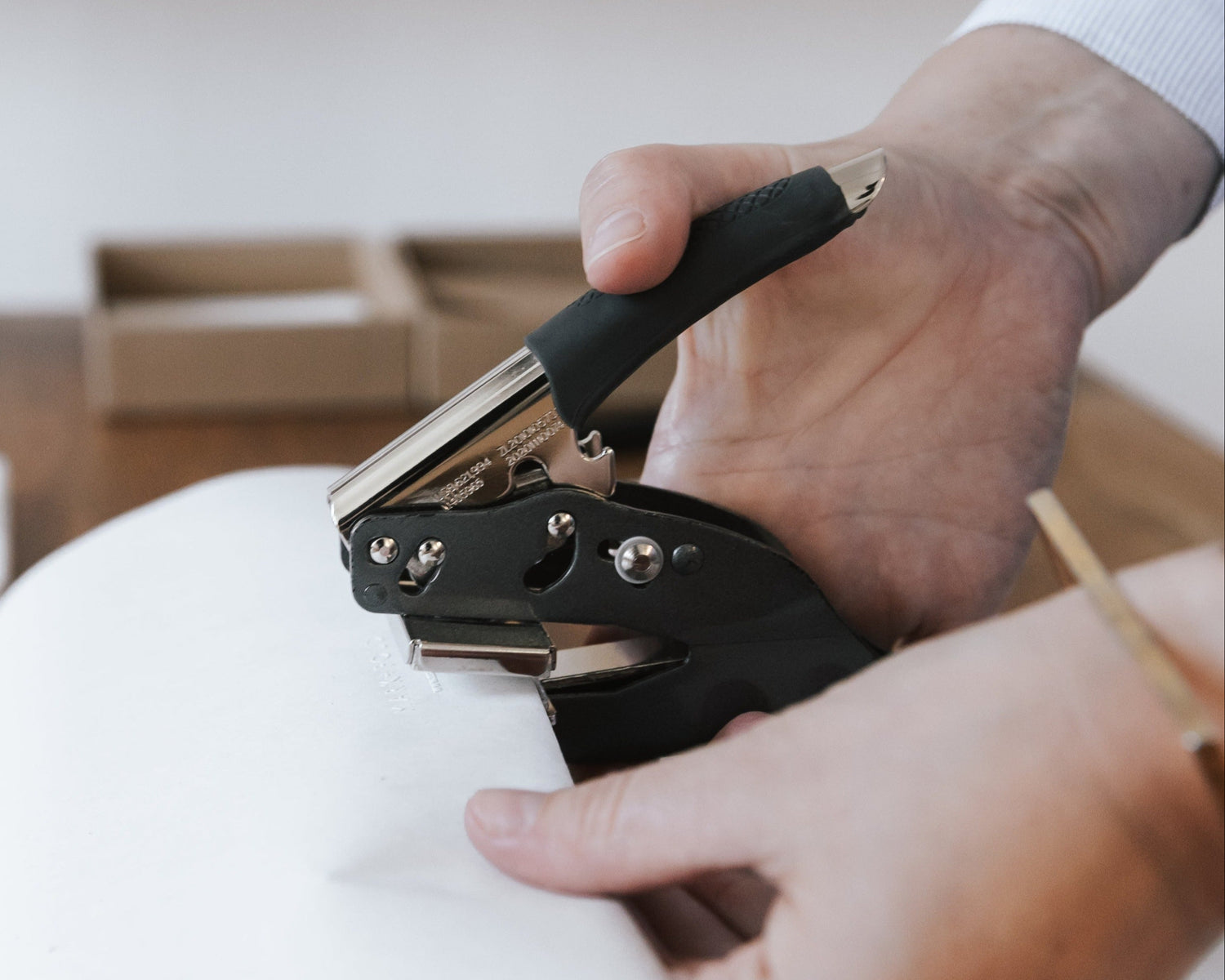 embossing sheets of paper at the mark and fold stationery studio