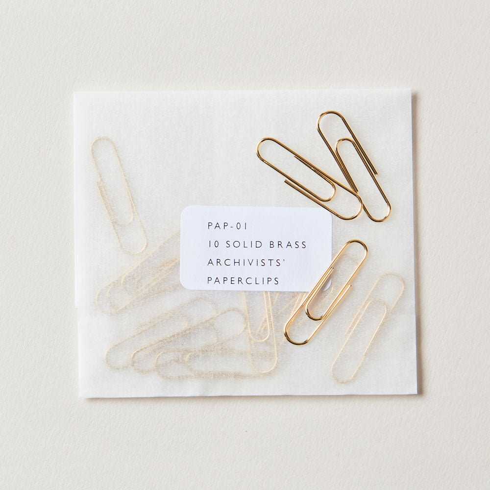 Solid Brass Paperclips. Made for archivists and librarians, will not tarnish delicate paper. Available at markandfold.com