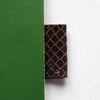 Green leather notebook cover with brown pen loop from Doe Leather's archive of rare swatches