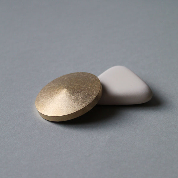 Solid brass paperweight, made in Japan.