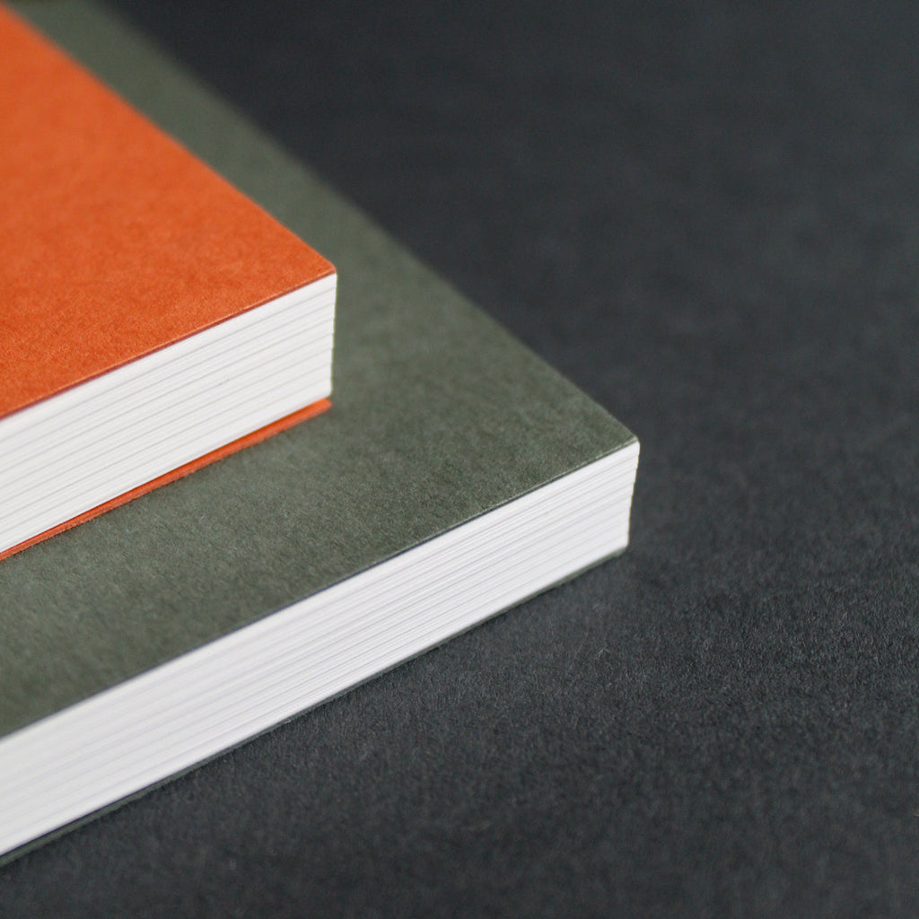 Mark+Fold notebooks in RUst and Sequoia. Layflat notebooks, lined pages