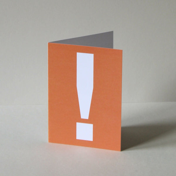 Akzidenz Grotesk. A6 greetings card, printed offset litho in orange ink onto white card. A useful card to have around for when an occasion arises, featuring this most expressive and universal symbol:  the exclamation card says Congratulations! Happy Birthday! I love you! etc. 